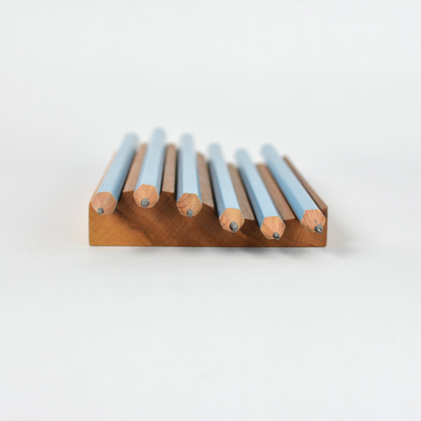 Cherry - wave pencil tray profile view