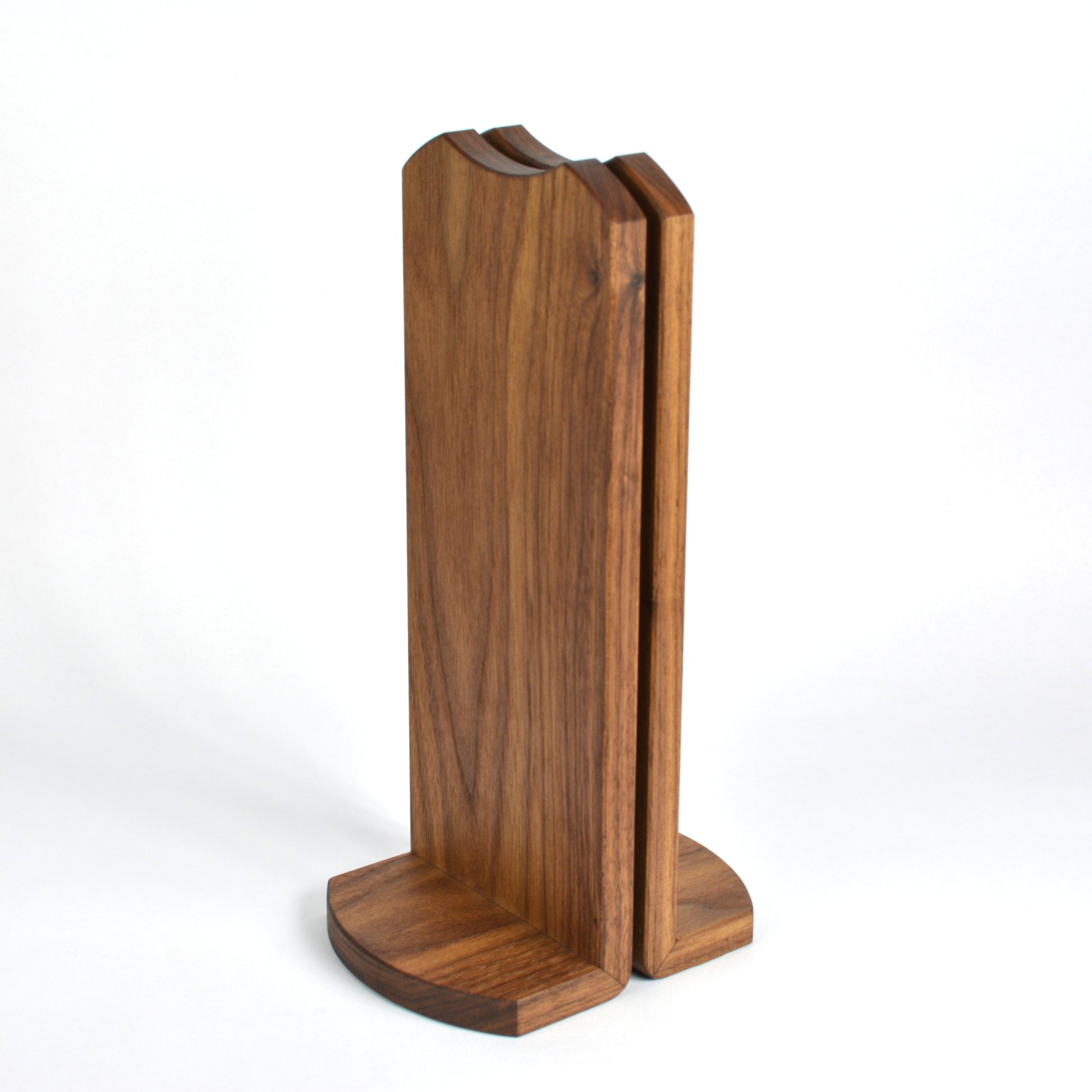 Wooden headset stand on a white background