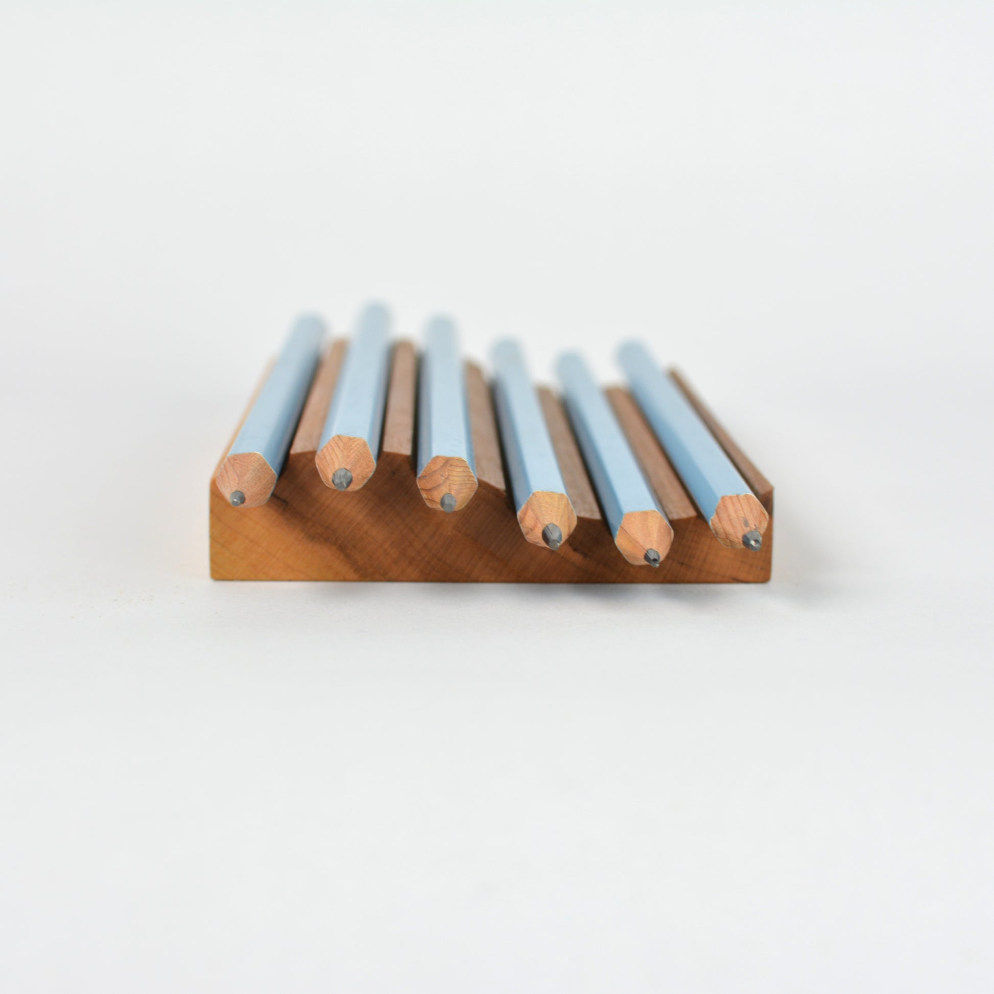 Cherry - wave pencil tray profile view